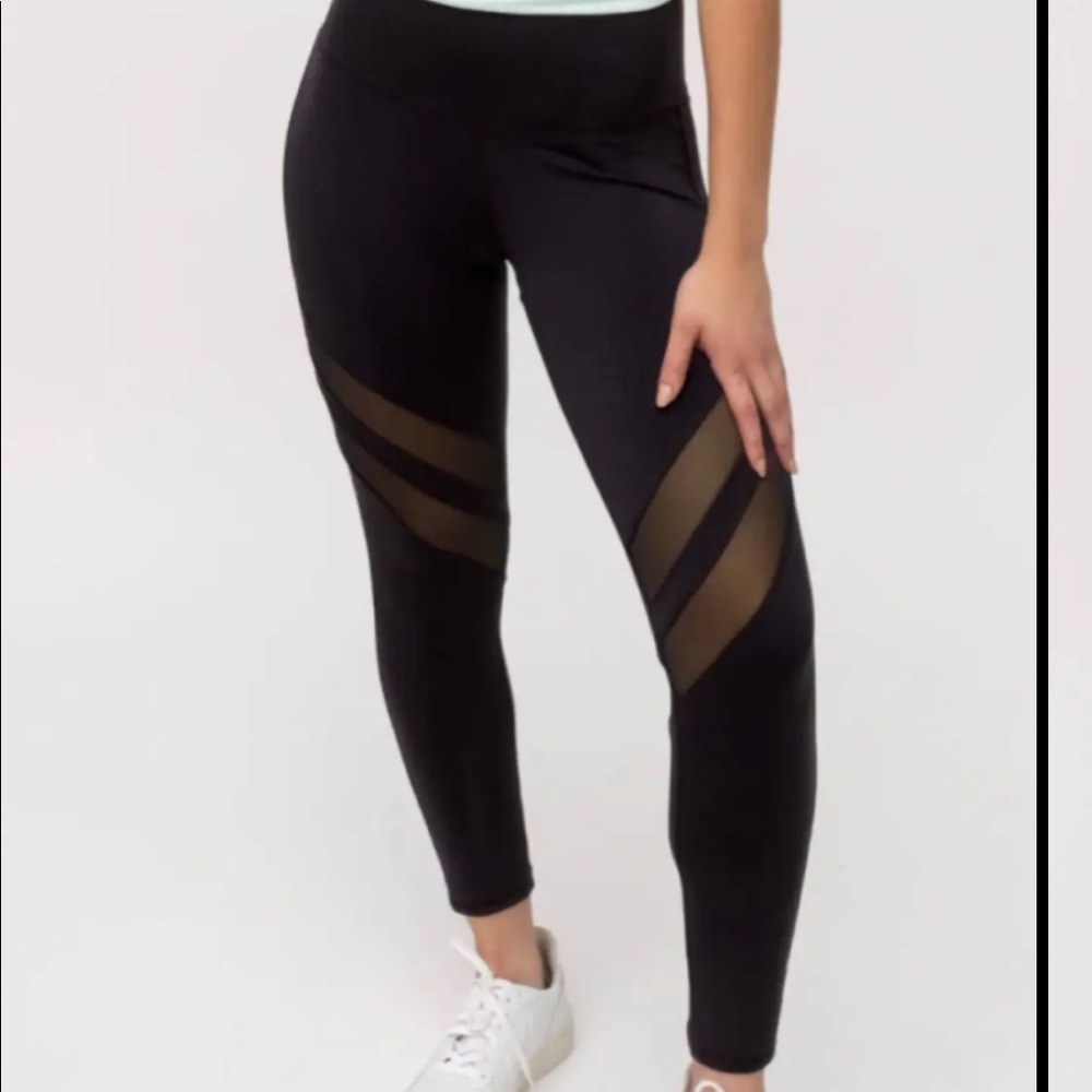 Black Tasc leggings! Cute mesh detail. Great condition!
